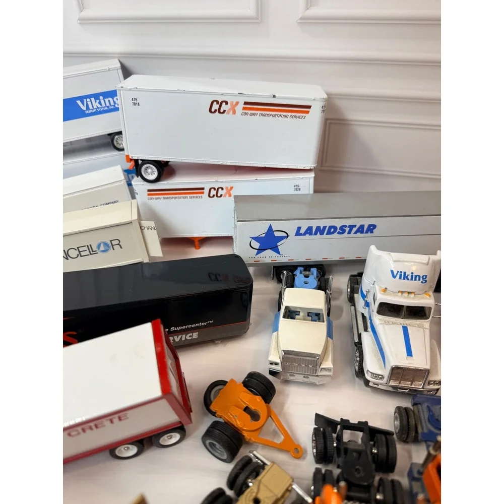 Mixed Semi Truck and Trailer Model Lot Roadway Viking CRST Repair Project